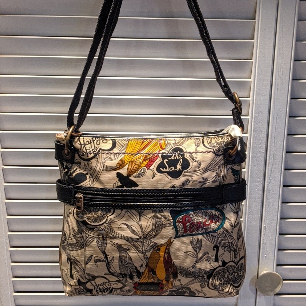 Sakroots Flat Crossbody Bag.